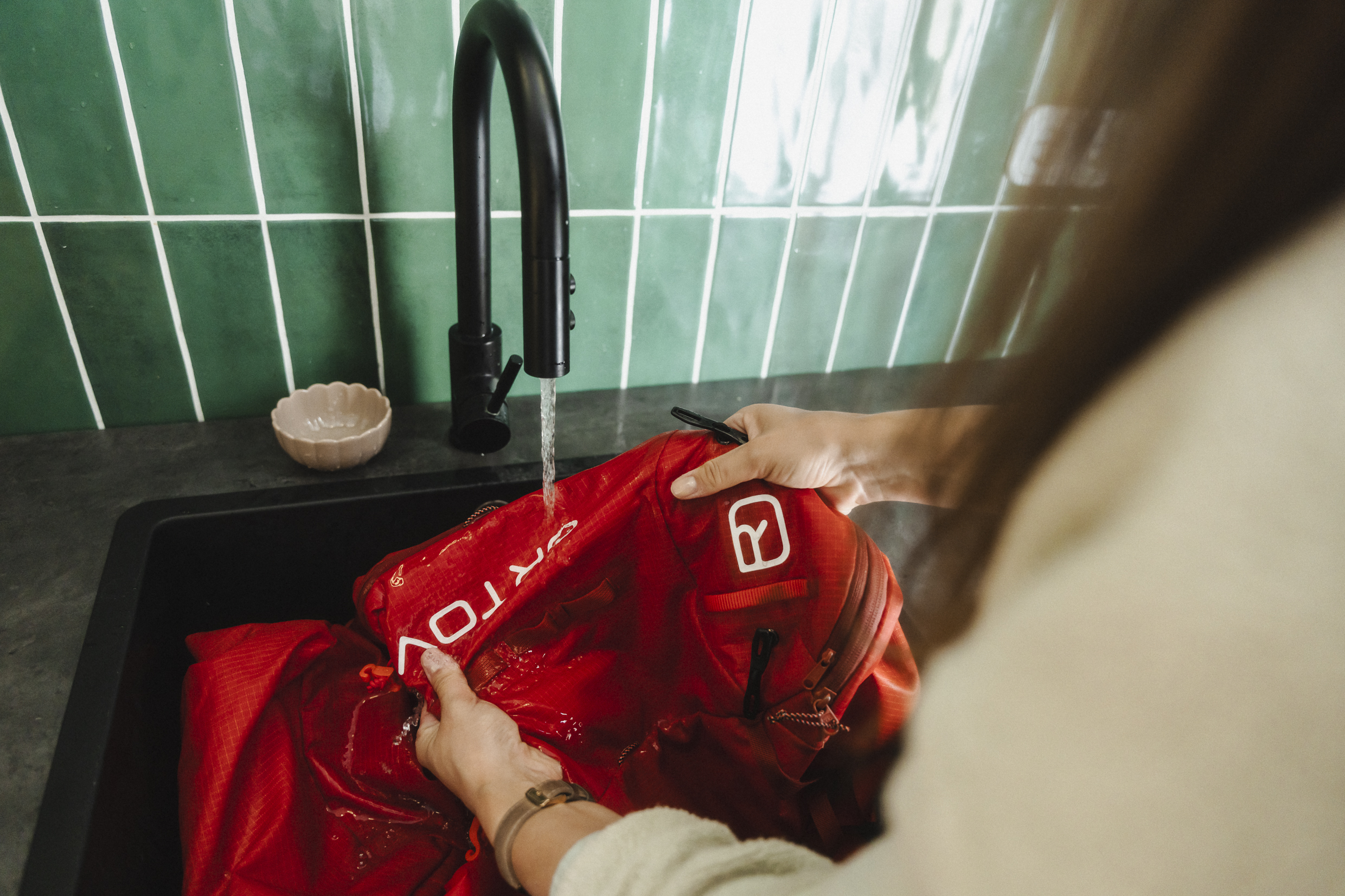 Clothing, Coat, Body Part, Hand, Person