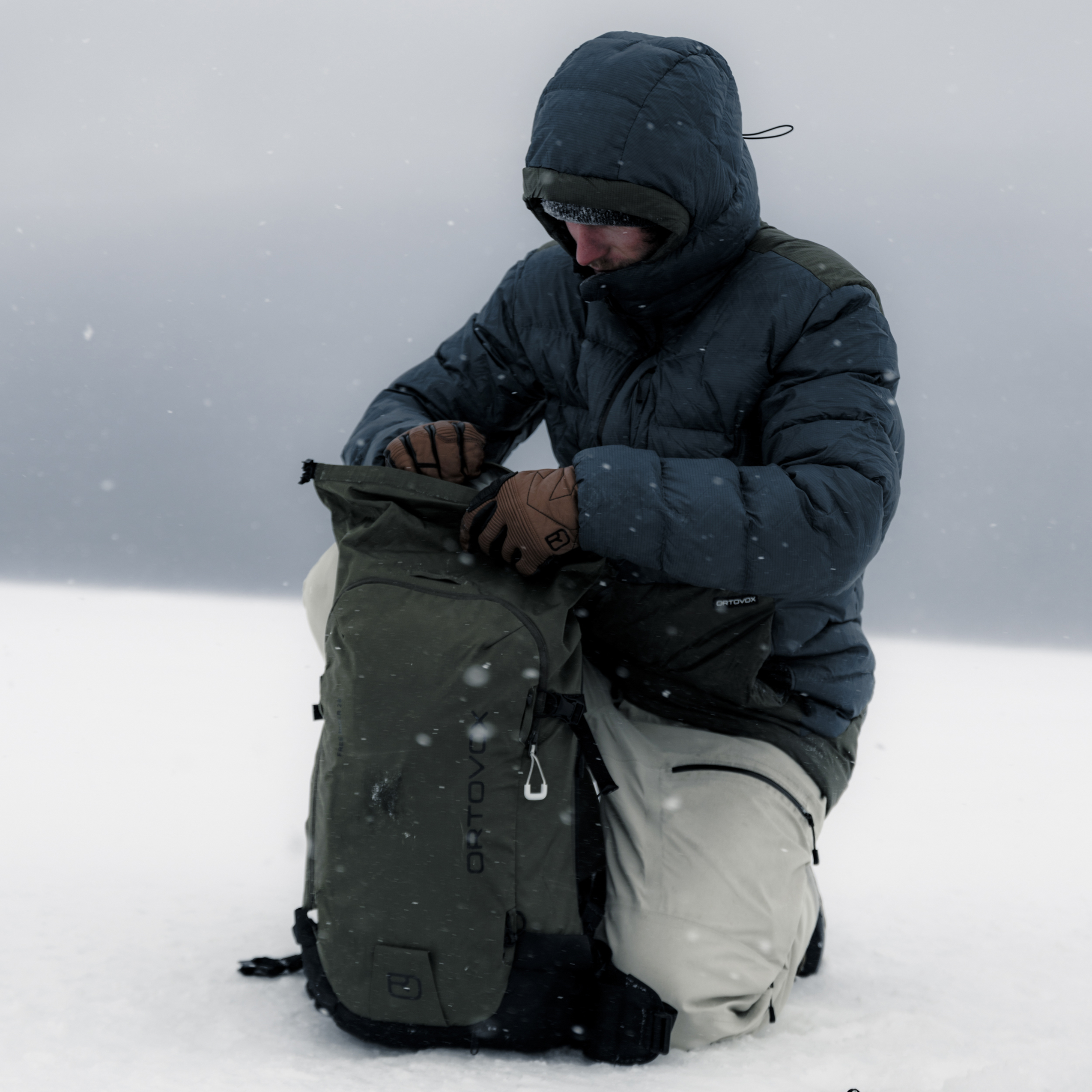 Glove, Coat, Person, Outdoors, Hood, Glove, Coat, Person, Outdoors, Hood